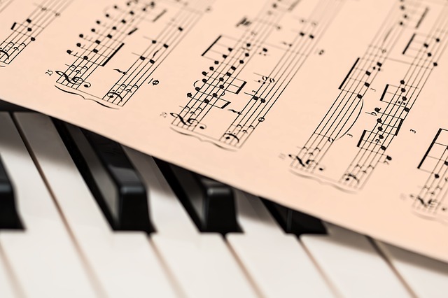Piano keys with music score